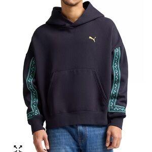 Puma  Men's Oversized-Fit Road to Unity Hoodie